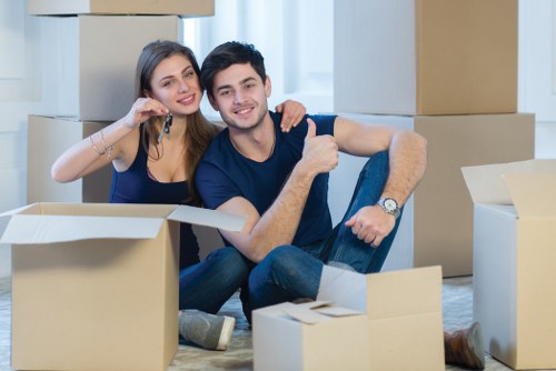 Removal team preparing flat removals in Nagshead with boxes and furniture