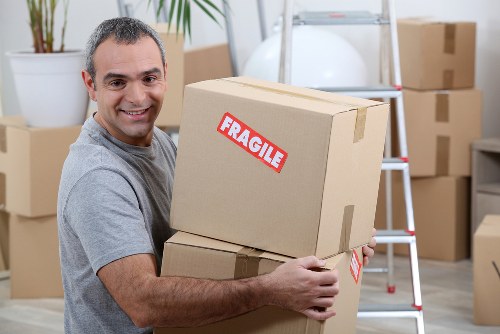 Carefully packed furniture and boxes in a long-term storage unit in Nagshead