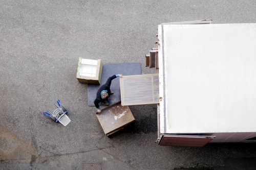 Professional movers handling furniture during flat removals in Nagshead