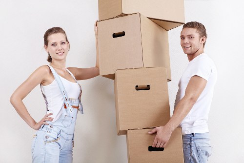 Family organizing boxes for mobile self storage in Nagshead
